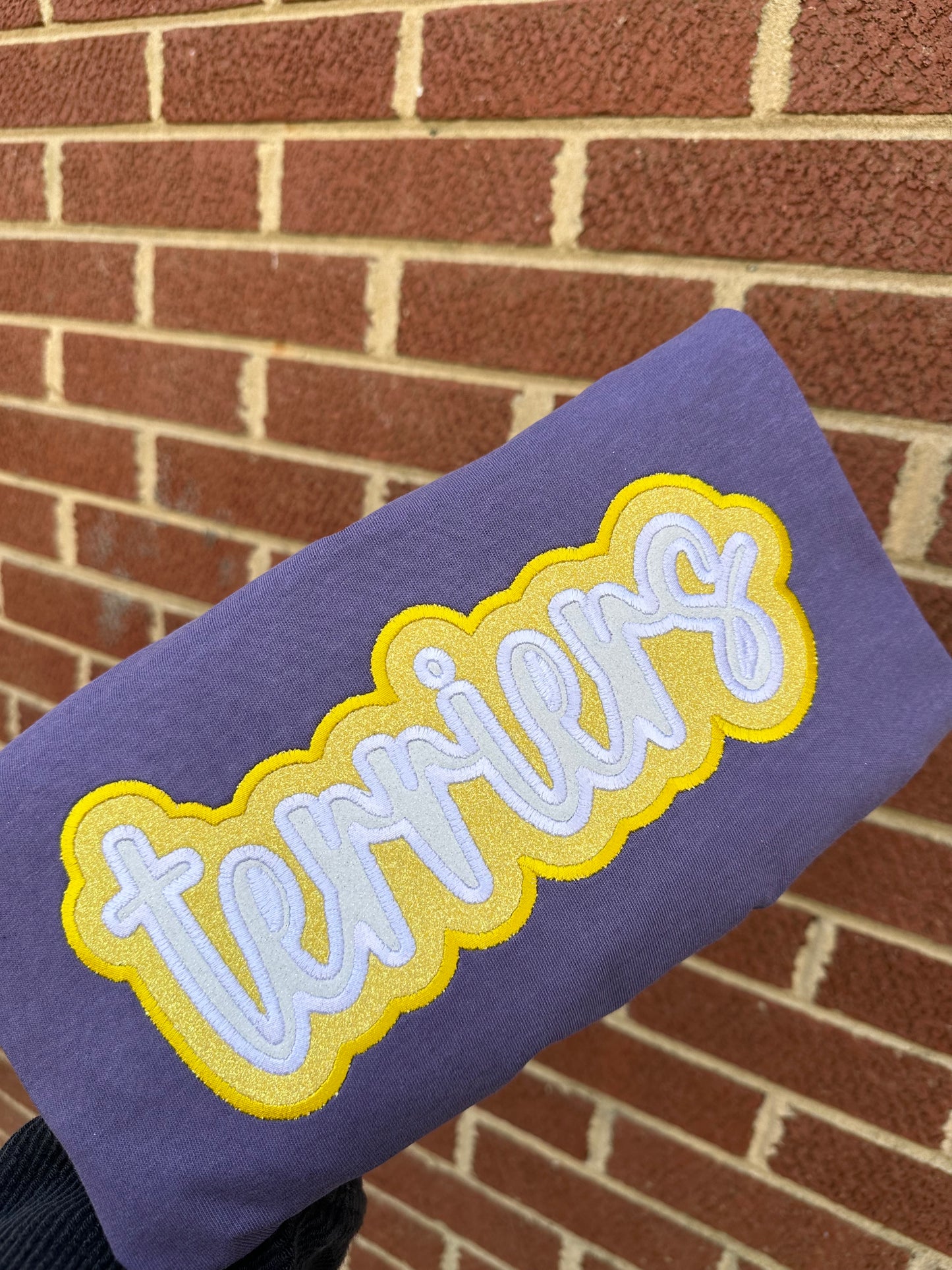 DOUBLE STACKED GLITTER MASCOT TERRIERS- PURPLE AND GOLD