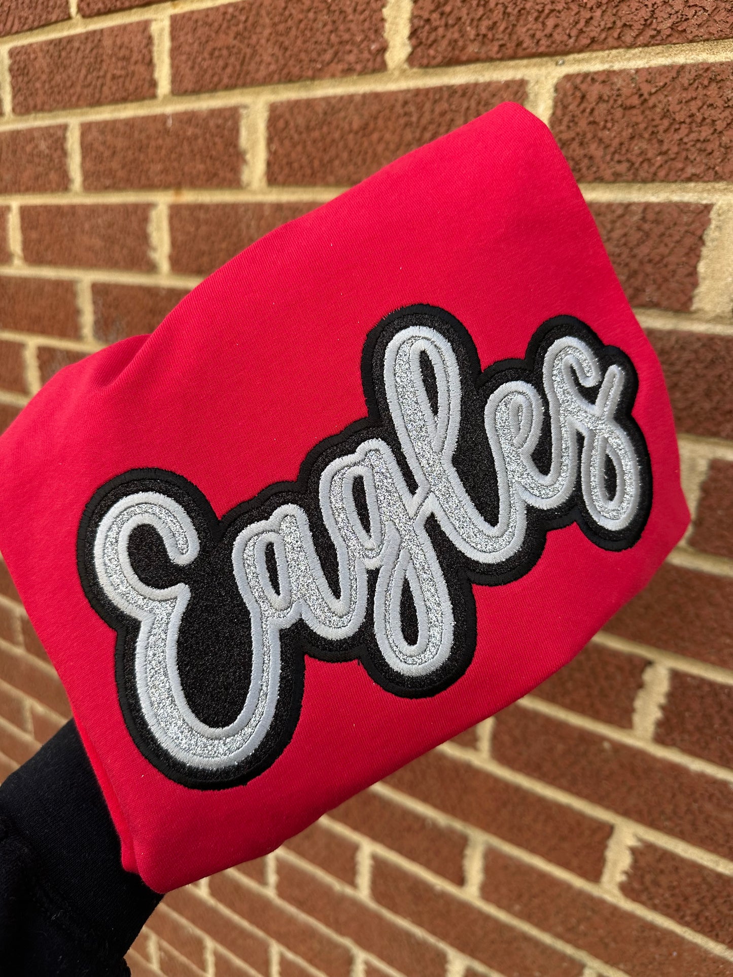 DOUBLE STACKED GLITTER MASCOT EAGLES RED AND BLACK