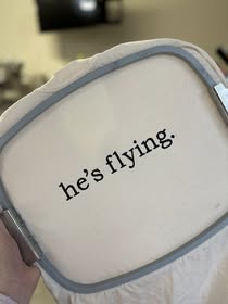 He's flying embroidered shirt