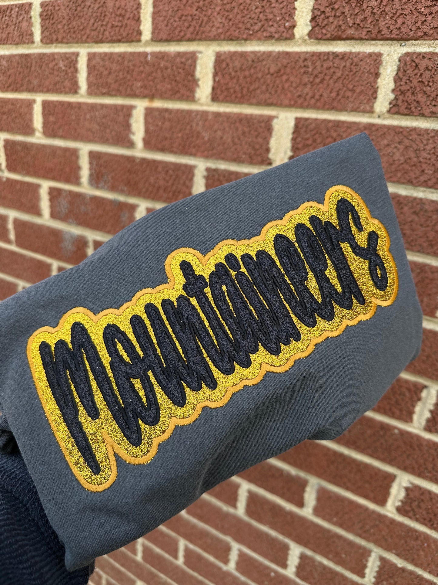 DOUBLE STACKED GLITTER MASCOT MOUNTAINEERS- PEPPER