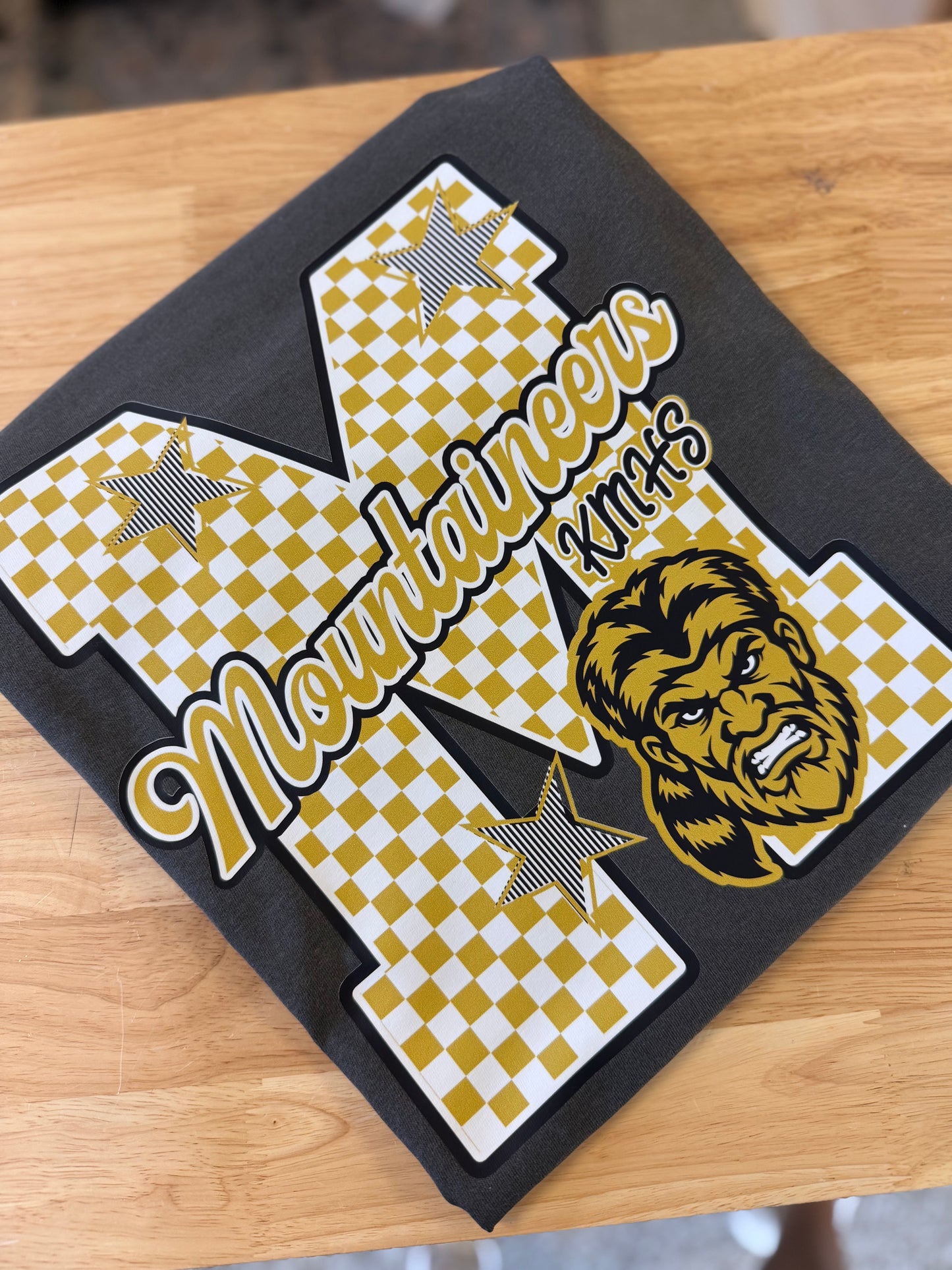 MOUNTAINEERS CHECKERED MASCOT TEE